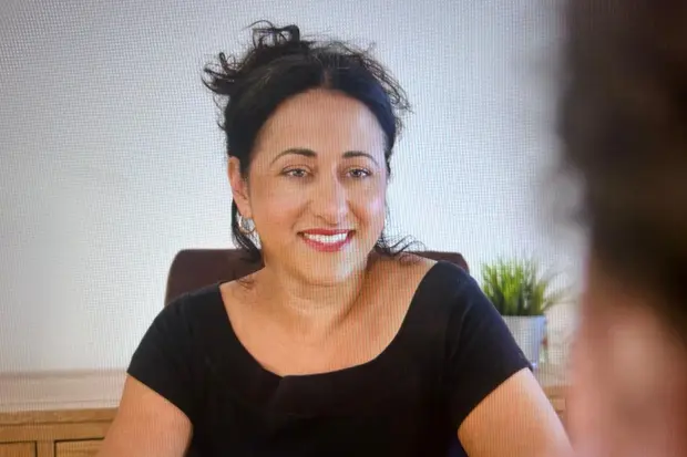 Rowena listening during a coaching session